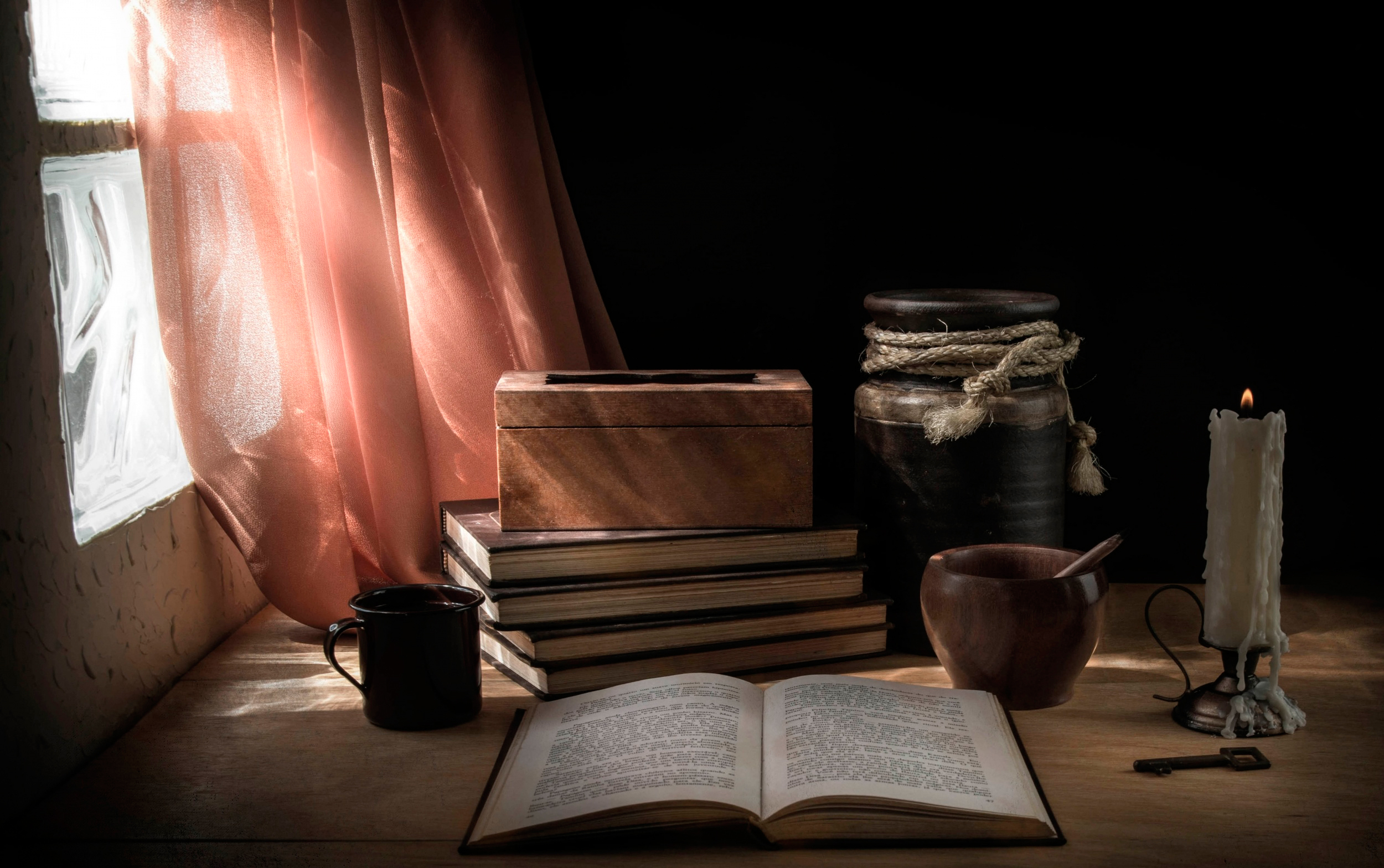 книга свеча окно стол ступка